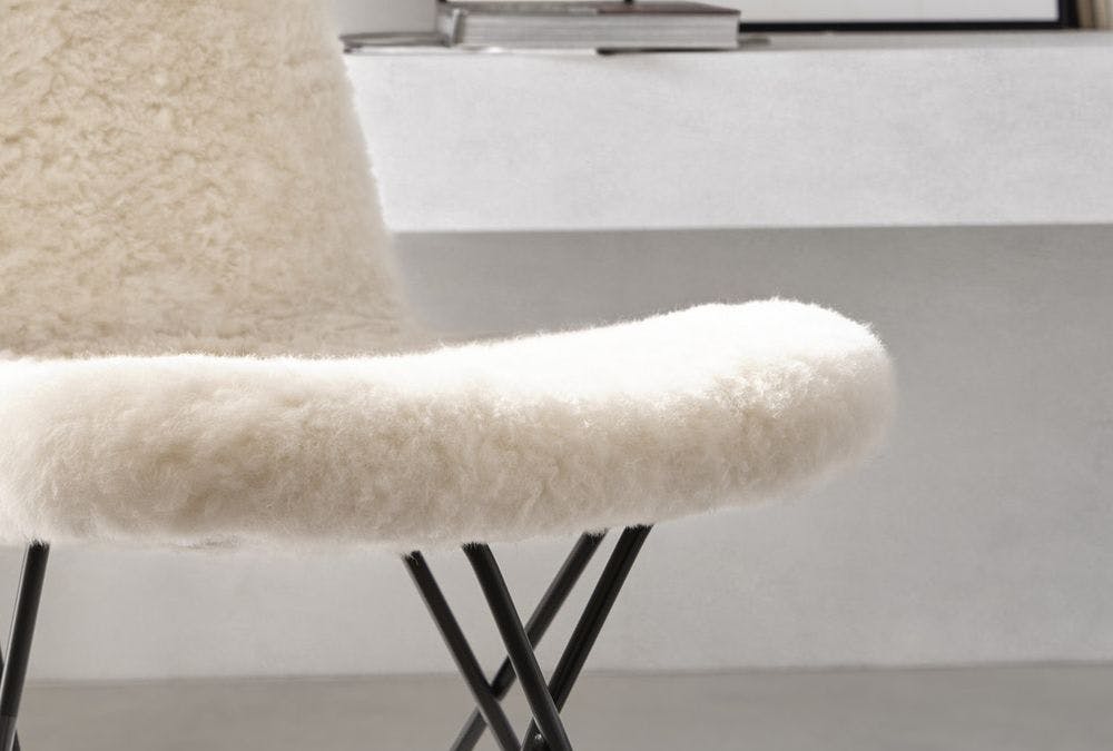 white fur dining chair up close upholstery details