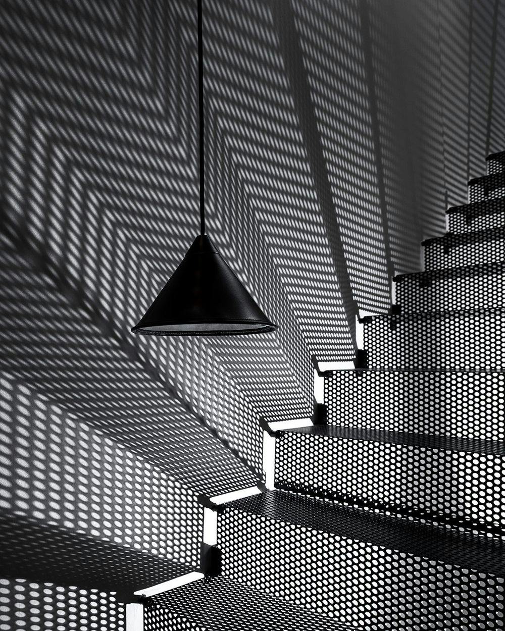 black and white leather cone lamp stairs shadow game