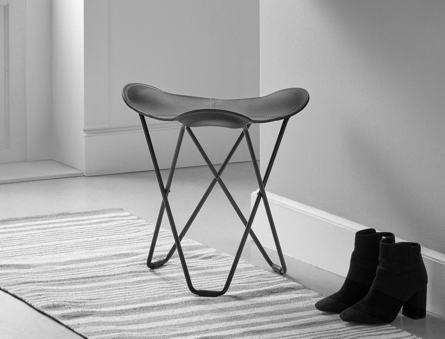 black and white leather stool entrance