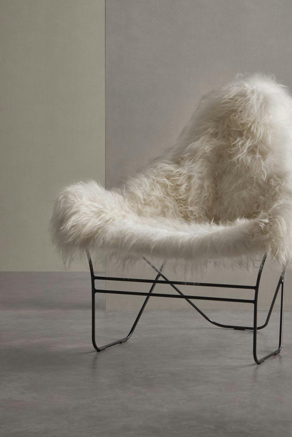 white sheepskin fur armchair