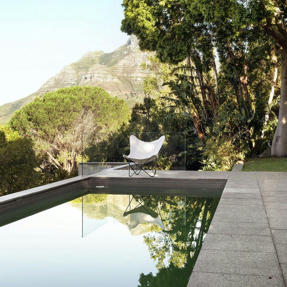 white outdoor bfk poolside with mountain range