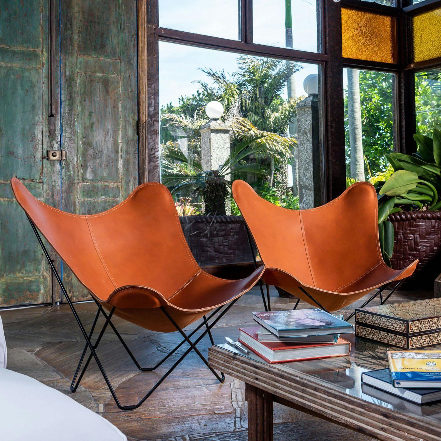 Two leather butterfly chairs in Brazil - chateau joa - rio de janeiro