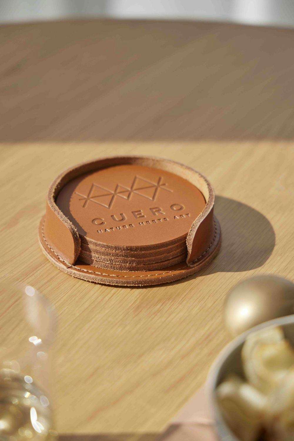 leather coasters in leather container