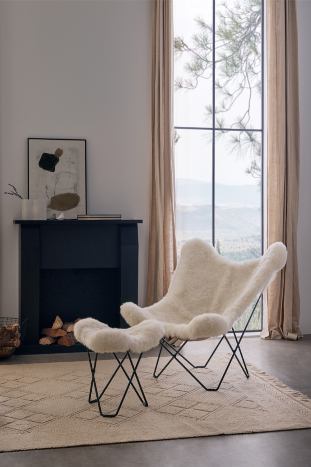 fur butterfly chair with matching footrest fireplace